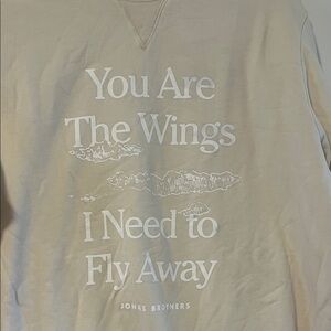 Jonas Brothers sweatshirt.